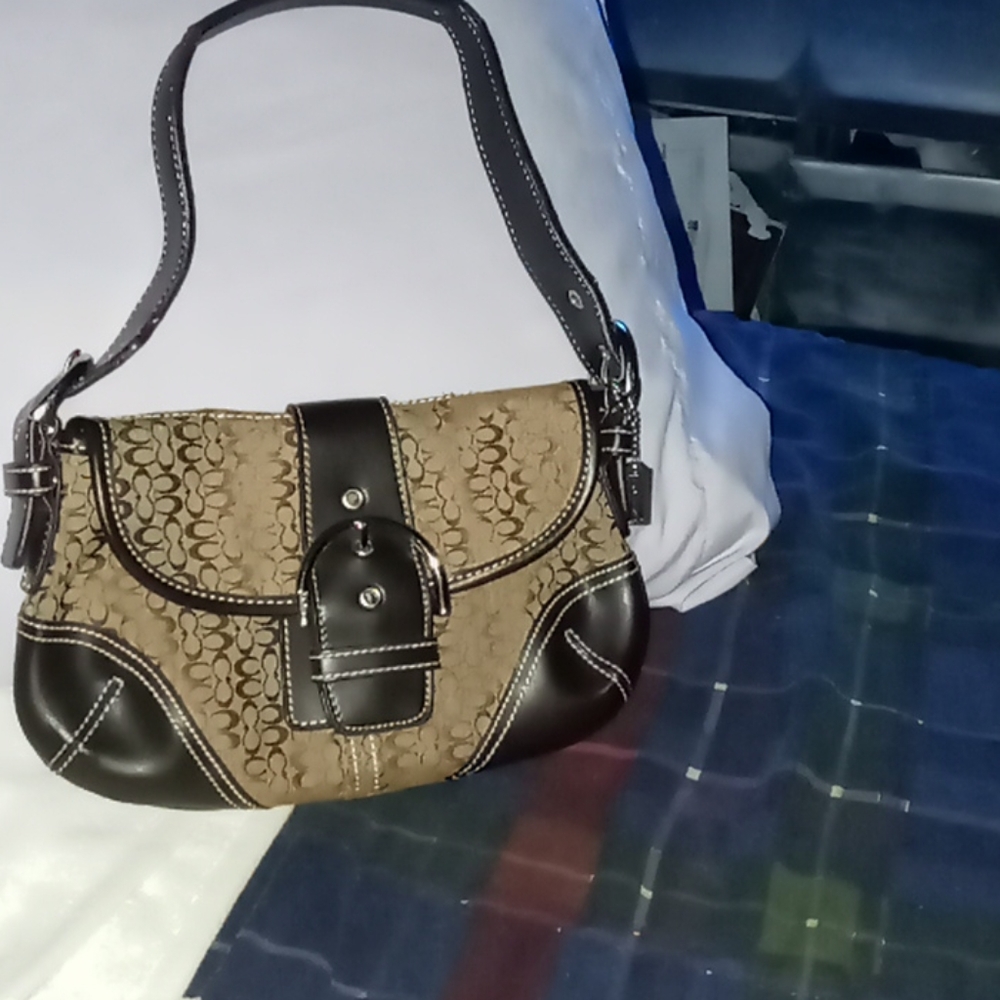 Dark brown and beige leather Coach purse